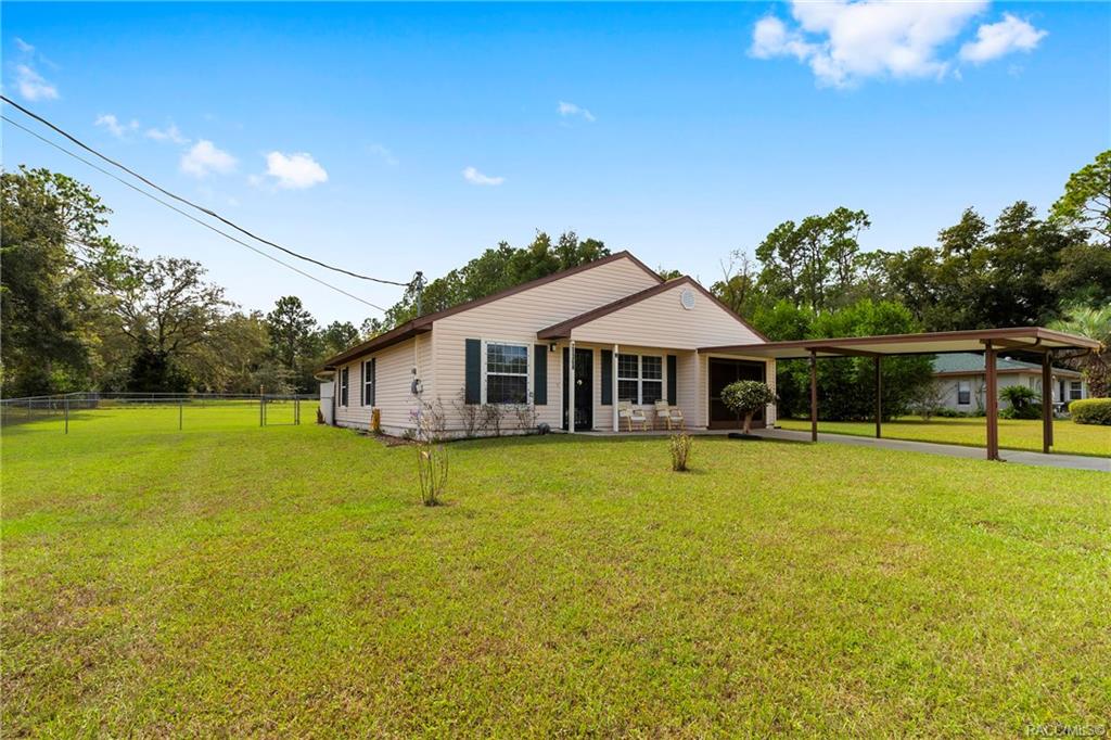 home for sale at 21368 SW Peach Blossom Street, Dunnellon, FL 34431 in Rainbow Lakes Estate